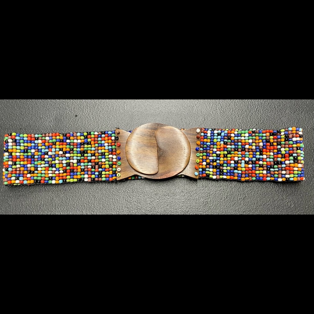 Boho beaded stretch belt with wooden clasp.  Small/medium